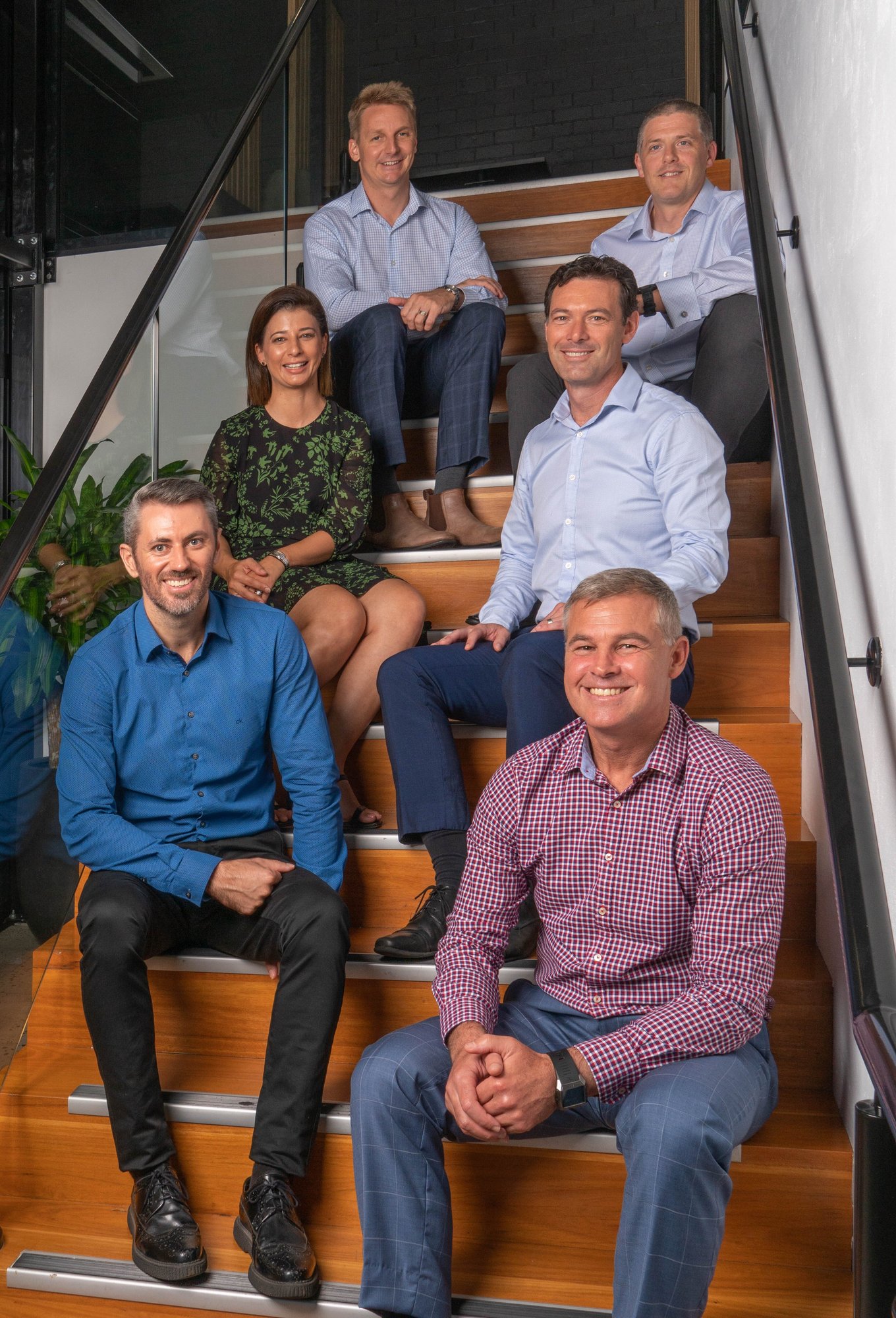 6 BLG Directors on stairs - Industry pages